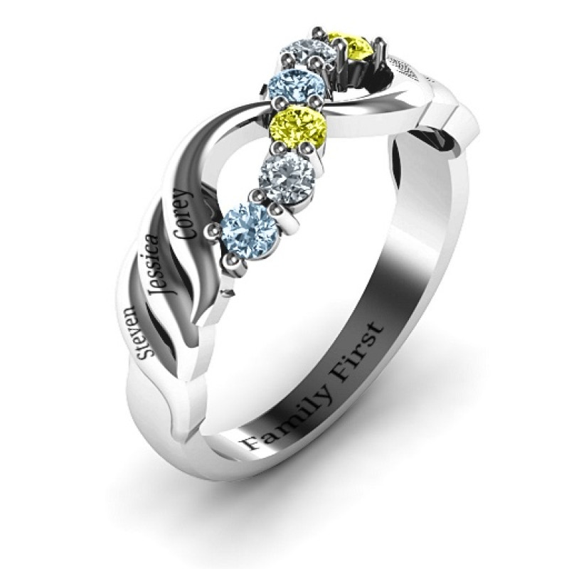 Infinity and wave ring with six round stones