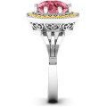 Round stone ring with an octagonal halo setting