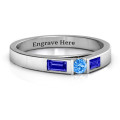 Solitaire Bridge Ring with Baguette Accents Solitaire bridge ring with a round centre stone and baguette accents