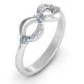 Three Stone Infinity Ring with Accent Stones Three stone infinity ring with round accent stones