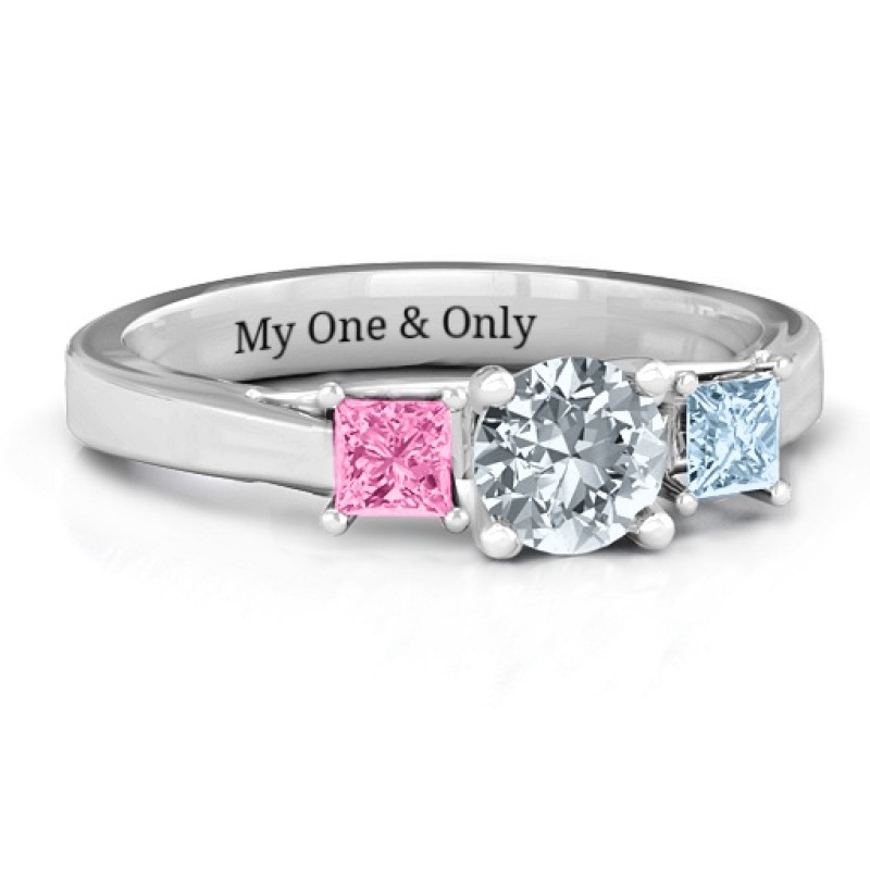 Three Stone Eternity Ring with Princess Accents Three Stone Eternity ring with a round centre stone and princess-cut side stone accents