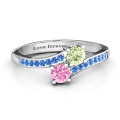 Two stone ring with sparkling accent stones and filigree settings