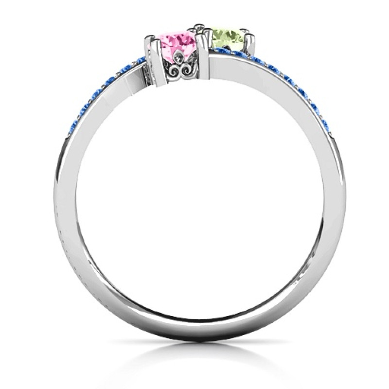 Two stone ring with sparkling accent stones and filigree settings