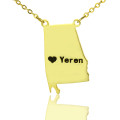Gold-colour USA state map necklace with a heart location detail