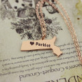 Massachusetts state-shaped personalised name necklace with heart detail