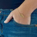 18ct Gold Plated Silver Monogram Bracelet Personalised monogram bracelet with an initials pendant and rollo chain