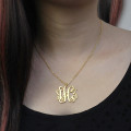 Personalised solid gold monogram necklace product image