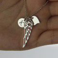 Personalised Angel Wing Necklace Girls angel wing necklace with personalised heart and initial charms