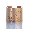 Engraved monogram cuff ring detail