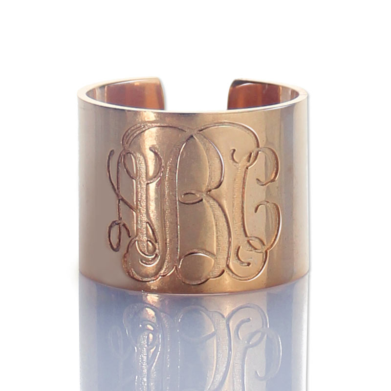 Engraved monogram cuff ring detail