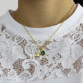Custom birthstone initial necklace detail view