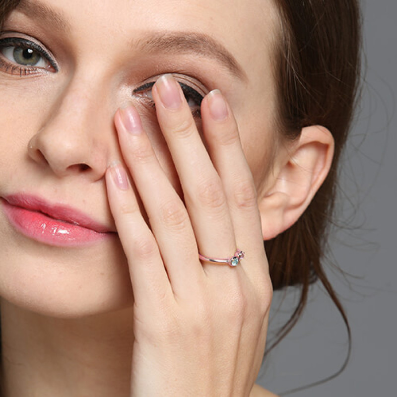 Dual birthstone ring detail view