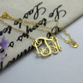 Cut-out personalised monogram necklace with initial pendant