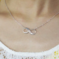 Engraved Name Infinity Necklace Sterling Silver Engraved name infinity necklace in sterling silver