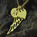 Angel Wing Initial Charm Detail Angel wing necklace detail with initial charm