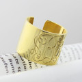 Personalised script monogram cuff ring close-up