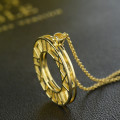 Double Circle Roman Numeral Necklace Detail Double-circle Roman numeral necklace detail image