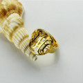 Custom circle cut-out monogrammed ring close-up