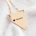 Custom Nevada state-shaped heart name necklace detail view