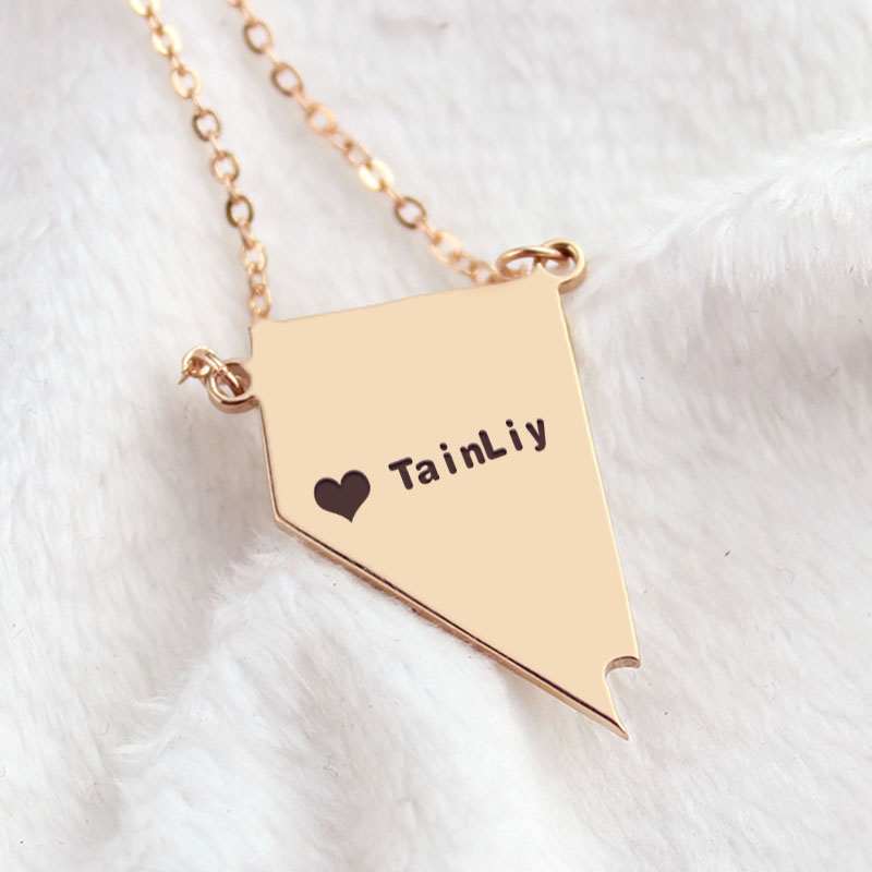 Custom Nevada state-shaped heart name necklace detail view