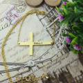 Engraved Latin cross name necklace detail view