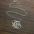 Personalised cut-out clover monogram necklace in sterling silver