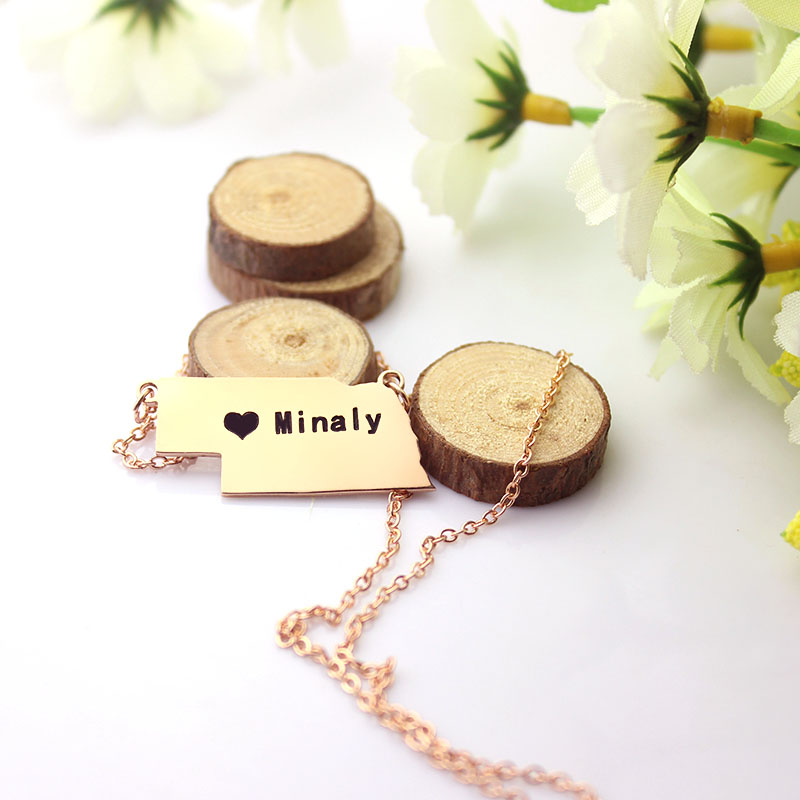 Rose gold colour Nebraska state name necklace product view