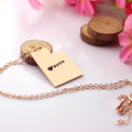 Custom Utah state-shaped heart name necklace detail