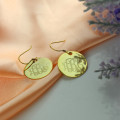 Cut-out monogram earring design