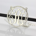 Cut-out circle monogram jewellery design