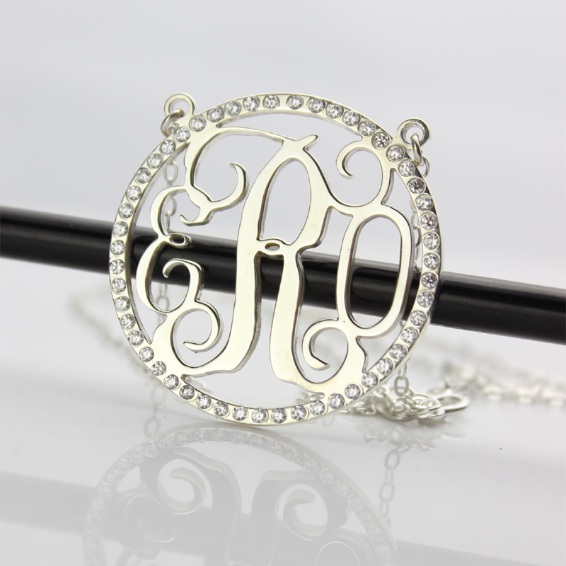 Cut-out circle monogram jewellery design