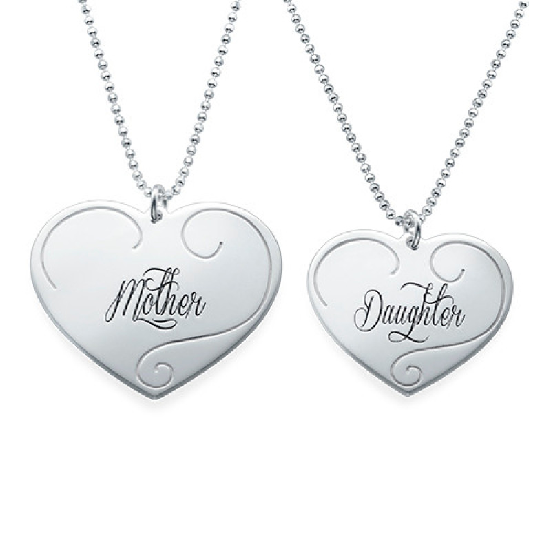 Matching engraved heart pendant necklaces for mother and daughter