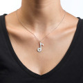 Engraved sterling silver music note necklace with optional birthstone crystal