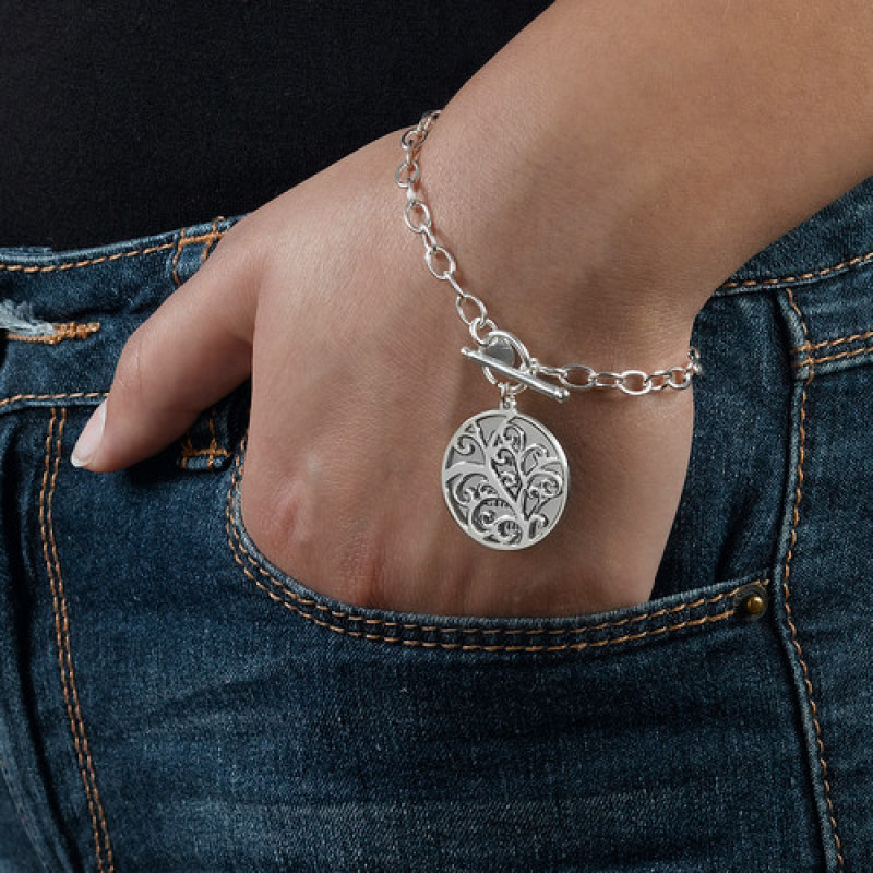 Filigree Tree of Life Bracelet Detail Filigree Tree of Life bracelet with tree pendant and link chain