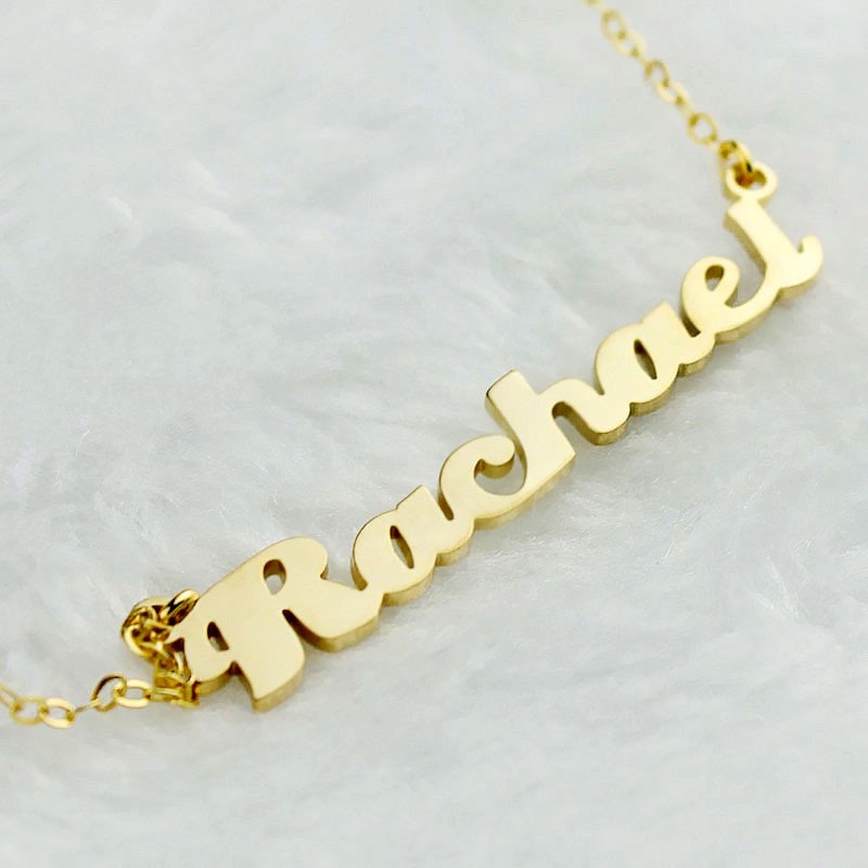 Gold Love Pendant Close-up of a gold personalised name pendant