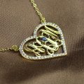 Gold heart monogram jewellery detail