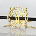 Gold monogram necklace with circular initial pendant