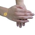 Engraved Initial Disc Bracelet Detail Gold plated initial disc bracelet detail