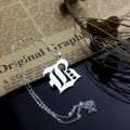 Personalised initial letter charm jewellery for children