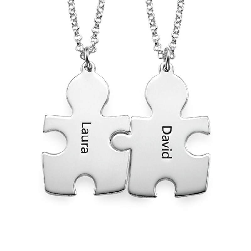 Personalised silver puzzle necklace with engraved jigsaw piece pendants