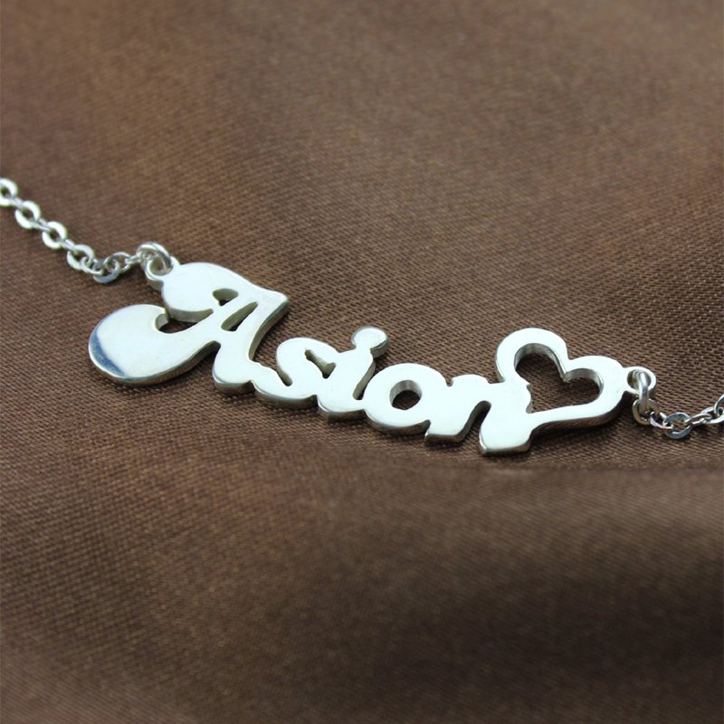 Silver letter pendant necklace detail