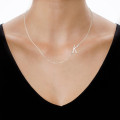 Silver Side Initial Necklace Silver Side Initial Necklace with a sideways letter pendant