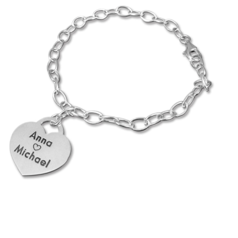 Personalised sterling silver heart charm bracelet with engraved names