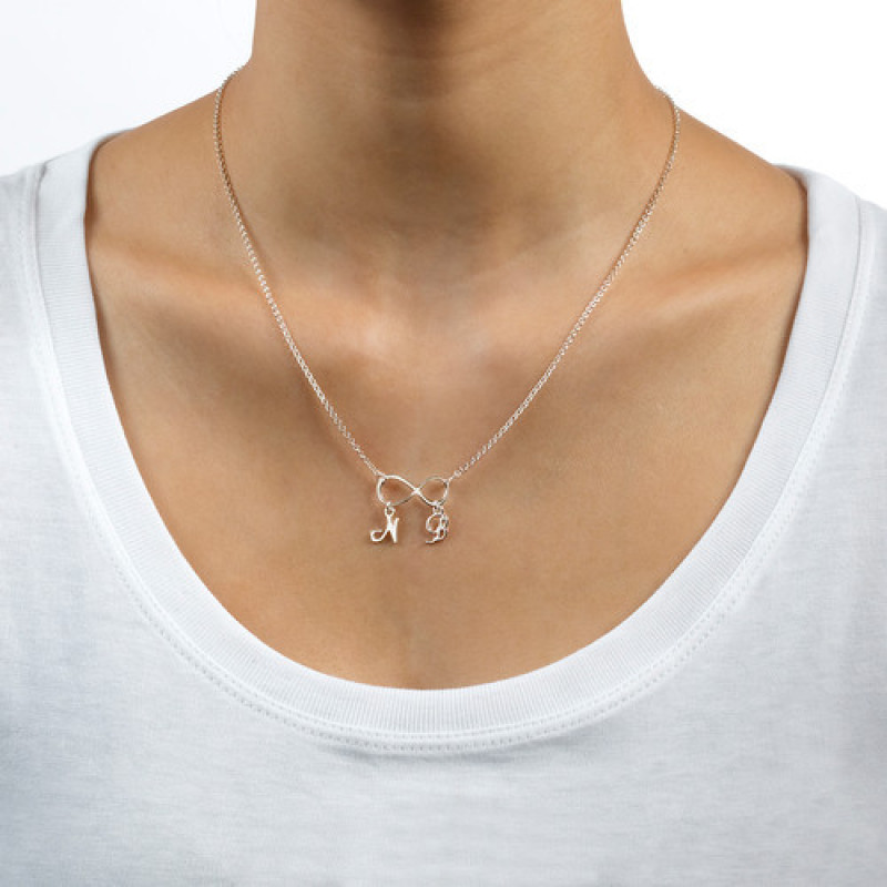 Personalised infinity necklace with two initial charms