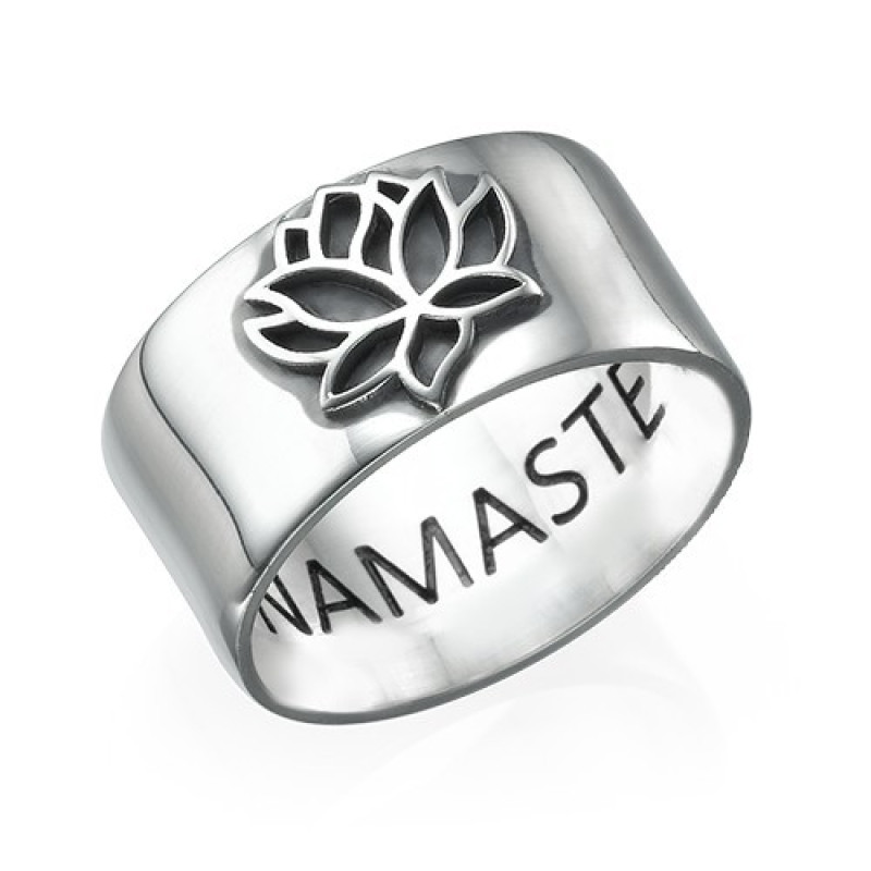 Sterling Silver Lotus Flower Ring Sterling silver lotus flower ring with engraved lotus design