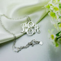 Personalised Vine Font Initial Monogram Necklace Personalised vine font initial monogram necklace with curved letters