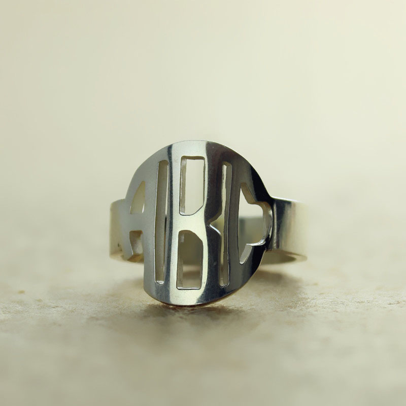 Circle Block Monogram Ring Detail Circle block monogram three-initial ring detail image