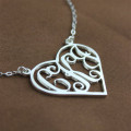White gold monogram pendant