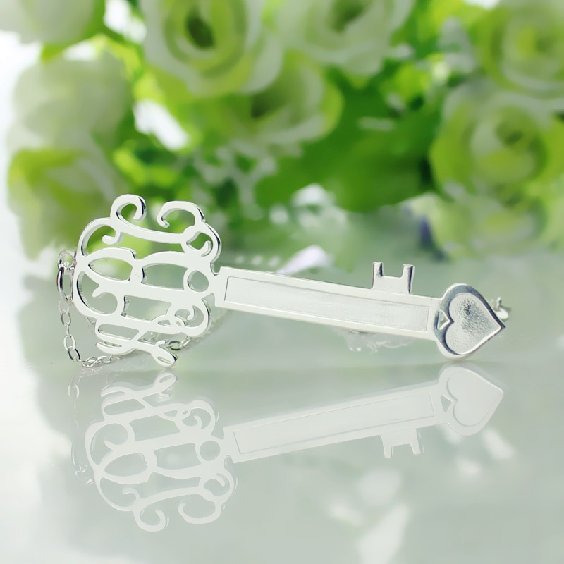 White gold monogram pendant option