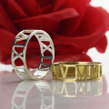 Custom Roman Numerals Ring Couple Image Couple image for the custom Roman numerals ring